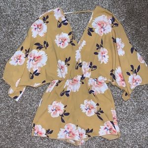 Yellow flowered romper! Super lightweight and cute